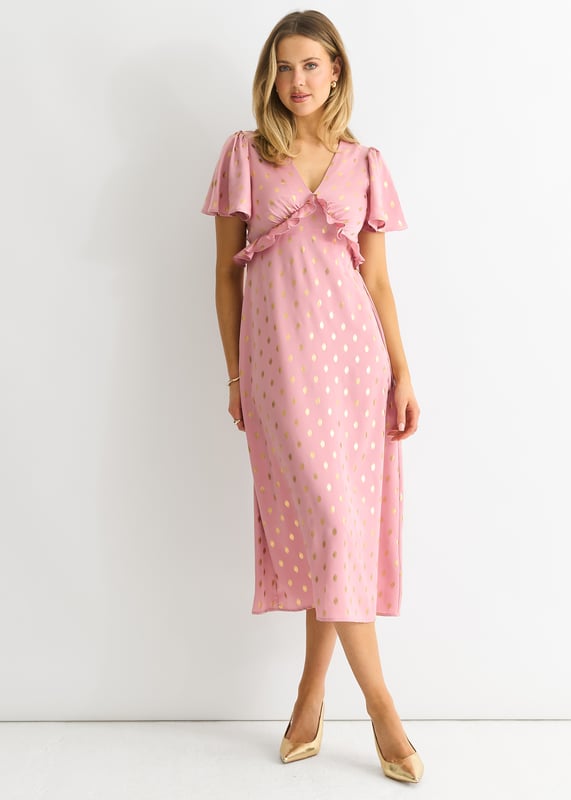 Eleva tu vestuario con este impresionante vestido midi con escote en V en color rubor metalizado. El lujoso color rubor, el favorecedor escote en pico y el llamativo diseño metalizado hacen de este vestido una prenda imprescindible para cualquier ocasión especial. Confeccionado con materiales de alta calidad, este vestido irradia elegancia y sofisticación. Completa tu look con este elegante vestido midi.