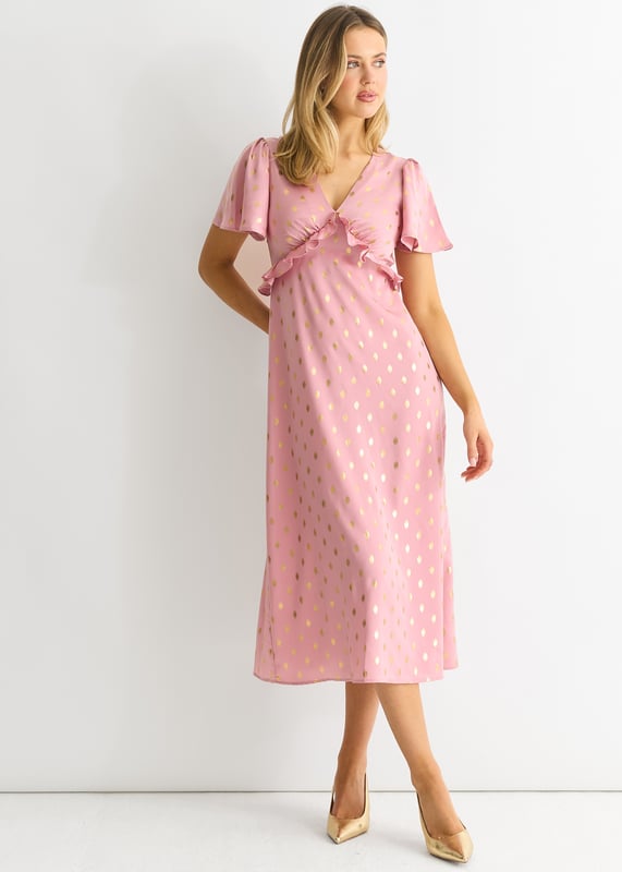 Eleva tu vestuario con este impresionante vestido midi con escote en V en color rubor metalizado. El lujoso color rubor, el favorecedor escote en pico y el llamativo diseño metalizado hacen de este vestido una prenda imprescindible para cualquier ocasión especial. Confeccionado con materiales de alta calidad, este vestido irradia elegancia y sofisticación. Completa tu look con este elegante vestido midi.