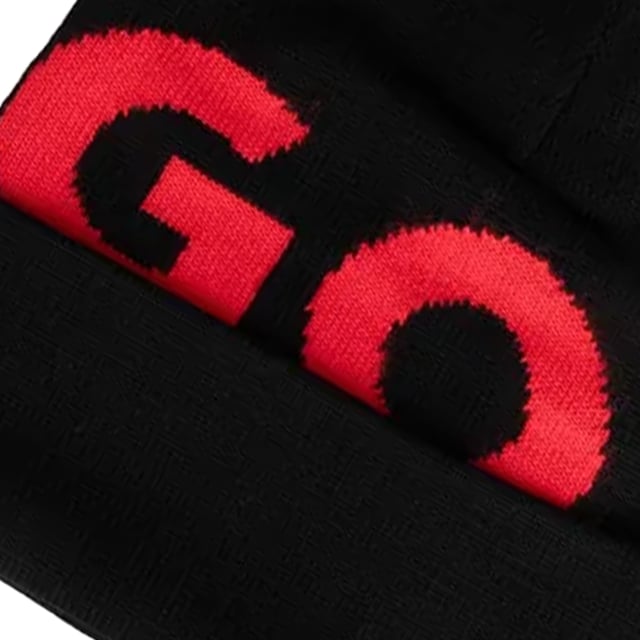 50% Scheerwol, 50% Polyacryl. Stof: Dubbellaags gebreid. Ontwerp: Logo, Ribbed. Opgedraaid manchet.