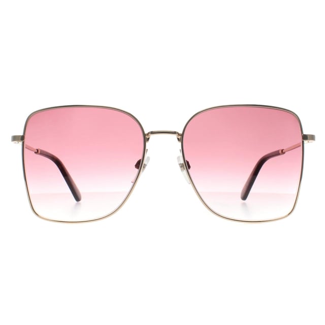 Marc Jacobs Square Womens Gold Pink Gradient MARC 829/S  Sunglasses offer an effortlessly stylish look with a sophisticated, everyday design. With a sleek and modern frame, they provide a perfect balance of fashion and comfort. The subtle branding and premium materials make them a great addition to any wardrobe.