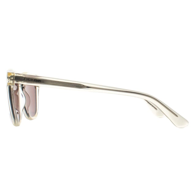 Calvin Klein Round Mens Nude Mauve CK23505S  Sunglasses is a sophisticated, round shaped frame designed for those who appreciate both style and substance. This model combines a modern silhouette with classic details, creating an accessory that can be worn both in the office and on casual outings. The frame is made from lightweight, durable materials that offer a comfortable fit while maintaining a high fashion edge that complements a variety of personal styles.