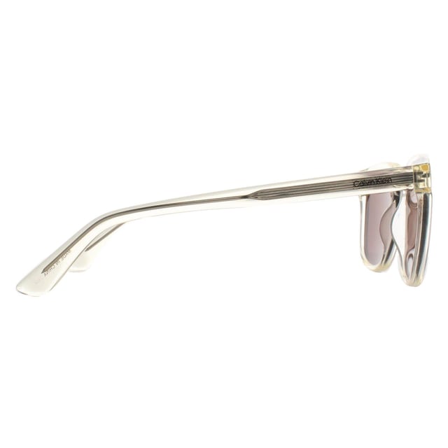 Calvin Klein Round Mens Nude Mauve CK23505S  Sunglasses is a sophisticated, round shaped frame designed for those who appreciate both style and substance. This model combines a modern silhouette with classic details, creating an accessory that can be worn both in the office and on casual outings. The frame is made from lightweight, durable materials that offer a comfortable fit while maintaining a high fashion edge that complements a variety of personal styles.