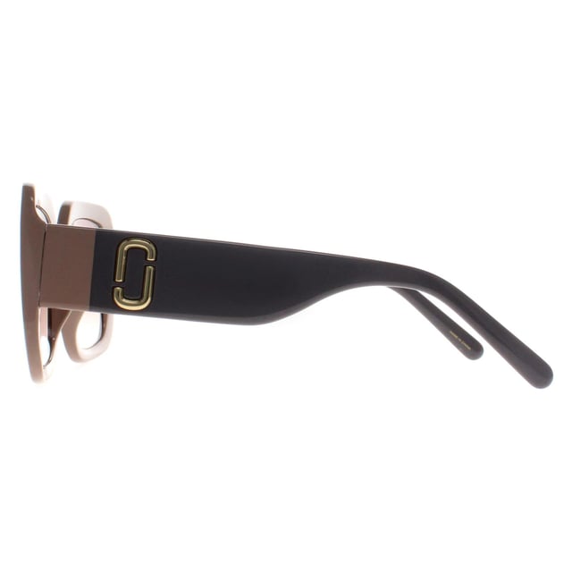 Marc Jacobs Square Womens Beige Gray Brown Gradient MARC 647/S  Sunglasses are a flawless fusion of timeless elegance and contemporary style. Crafted with meticulous attention to detail, these sunglasses feature a sleek and sophisticated design, boasting a classic square frame that exudes confidence and sophistication.