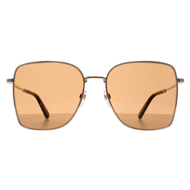 Marc Jacobs Square Womens Gold Brown MARC 829/S  Sunglasses offer an effortlessly stylish look with a sophisticated, everyday design. With a sleek and modern frame, they provide a perfect balance of fashion and comfort. The subtle branding and premium materials make them a great addition to any wardrobe.