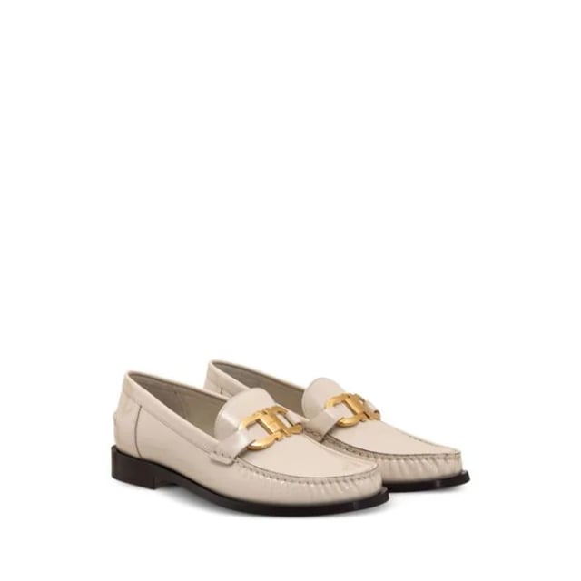 - Composición: 100% piel de becerro - Interior: Piel - Plantilla: Piel - Suela: Piel - Puntera redonda - Efecto charol - Logotipo dorado - Slip-on design - Made in Italy - Gender: MUJER -