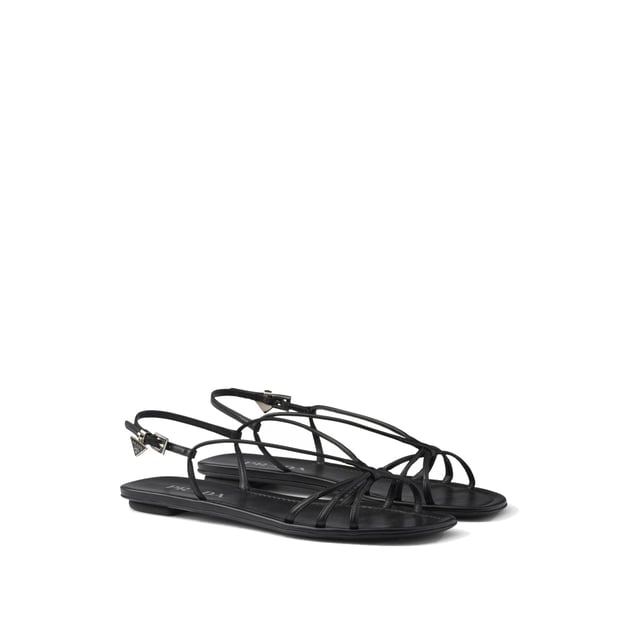 Sandalias Planas de Cuero Prada - Composición: 100% cuero de ternera - Interior: Cuero - Plantilla: Cuero - Suela: Cuero - Punta abierta - Punta cuadrada - Cierre con hebilla ajustable - Plantilla con marca - Logo de triángulo de esmalte - Hecho en Italia - Género: MUJERES -