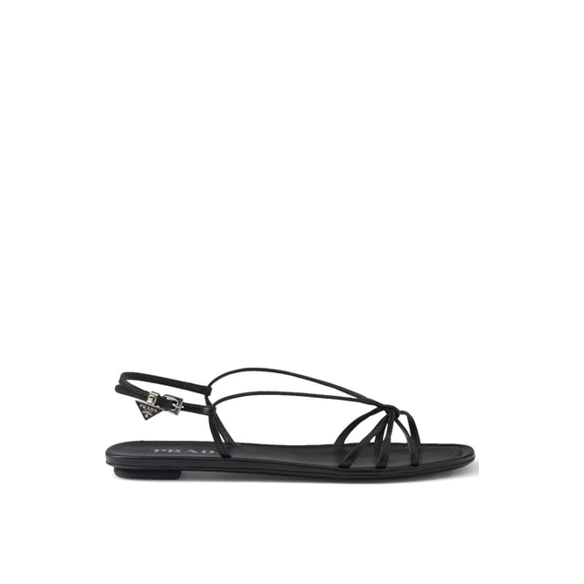 Sandalias Planas de Cuero Prada - Composición: 100% cuero de ternera - Interior: Cuero - Plantilla: Cuero - Suela: Cuero - Punta abierta - Punta cuadrada - Cierre con hebilla ajustable - Plantilla con marca - Logo de triángulo de esmalte - Hecho en Italia - Género: MUJERES -