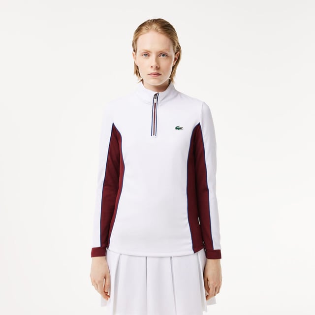 Womens Lacoste SPORT Slim Fit Contrast Sleeve Sport SweatshirtThis layering sweatshirt from Lacoste  sporting experts since 1933  is perfect for tennis or golf. Made from stretch jersey for maximum freedom of movement  with Ultra Dry technology and an anti-UV finish to keep you comfortable and protected. An elegant take on an essential design.- Recycled polyester made from manufacturing offcuts - Slim  fitted cut- Quick drying- Tested by professional players- Silicone crocodile on bust- Slim Fit- Polyester (96%)  Elastane (4%)  Machine washable.- Ref: SF1962-NIY
