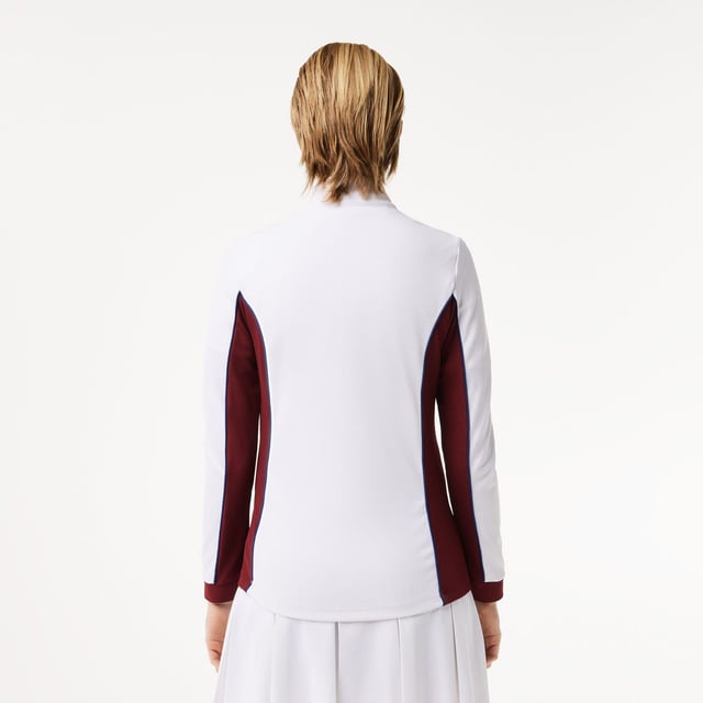 Womens Lacoste SPORT Slim Fit Contrast Sleeve Sport SweatshirtThis layering sweatshirt from Lacoste  sporting experts since 1933  is perfect for tennis or golf. Made from stretch jersey for maximum freedom of movement  with Ultra Dry technology and an anti-UV finish to keep you comfortable and protected. An elegant take on an essential design.- Recycled polyester made from manufacturing offcuts - Slim  fitted cut- Quick drying- Tested by professional players- Silicone crocodile on bust- Slim Fit- Polyester (96%)  Elastane (4%)  Machine washable.- Ref: SF1962-NIY