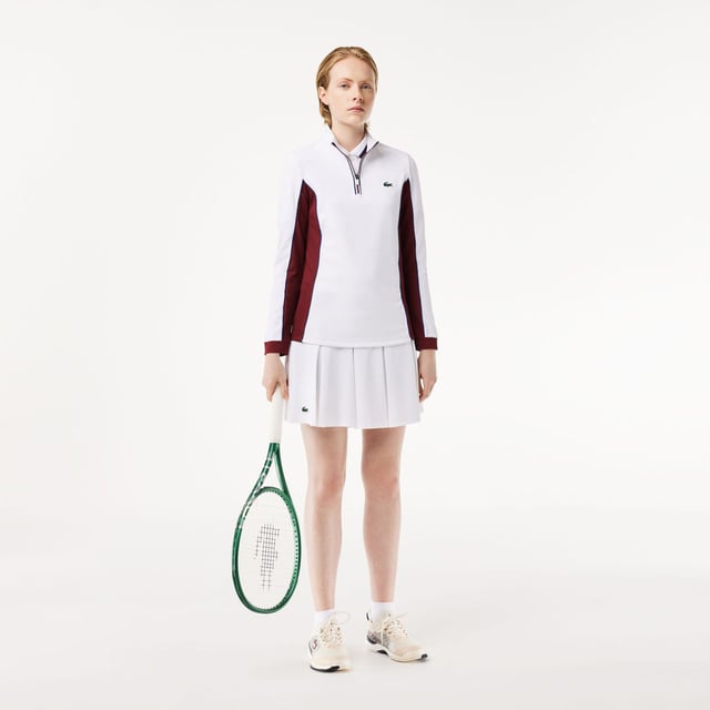 Womens Lacoste SPORT Slim Fit Contrast Sleeve Sport SweatshirtThis layering sweatshirt from Lacoste  sporting experts since 1933  is perfect for tennis or golf. Made from stretch jersey for maximum freedom of movement  with Ultra Dry technology and an anti-UV finish to keep you comfortable and protected. An elegant take on an essential design.- Recycled polyester made from manufacturing offcuts - Slim  fitted cut- Quick drying- Tested by professional players- Silicone crocodile on bust- Slim Fit- Polyester (96%)  Elastane (4%)  Machine washable.- Ref: SF1962-NIY