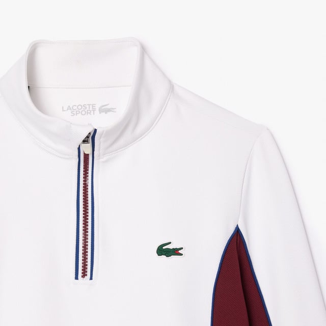 Womens Lacoste SPORT Slim Fit Contrast Sleeve Sport SweatshirtThis layering sweatshirt from Lacoste  sporting experts since 1933  is perfect for tennis or golf. Made from stretch jersey for maximum freedom of movement  with Ultra Dry technology and an anti-UV finish to keep you comfortable and protected. An elegant take on an essential design.- Recycled polyester made from manufacturing offcuts - Slim  fitted cut- Quick drying- Tested by professional players- Silicone crocodile on bust- Slim Fit- Polyester (96%)  Elastane (4%)  Machine washable.- Ref: SF1962-NIY