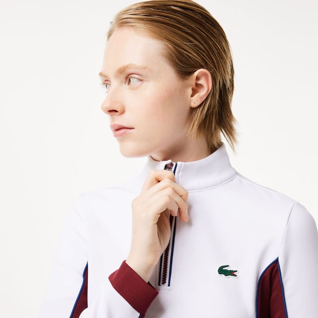 Womens Lacoste SPORT Slim Fit Contrast Sleeve Sport SweatshirtThis layering sweatshirt from Lacoste  sporting experts since 1933  is perfect for tennis or golf. Made from stretch jersey for maximum freedom of movement  with Ultra Dry technology and an anti-UV finish to keep you comfortable and protected. An elegant take on an essential design.- Recycled polyester made from manufacturing offcuts - Slim  fitted cut- Quick drying- Tested by professional players- Silicone crocodile on bust- Slim Fit- Polyester (96%)  Elastane (4%)  Machine washable.- Ref: SF1962-NIY