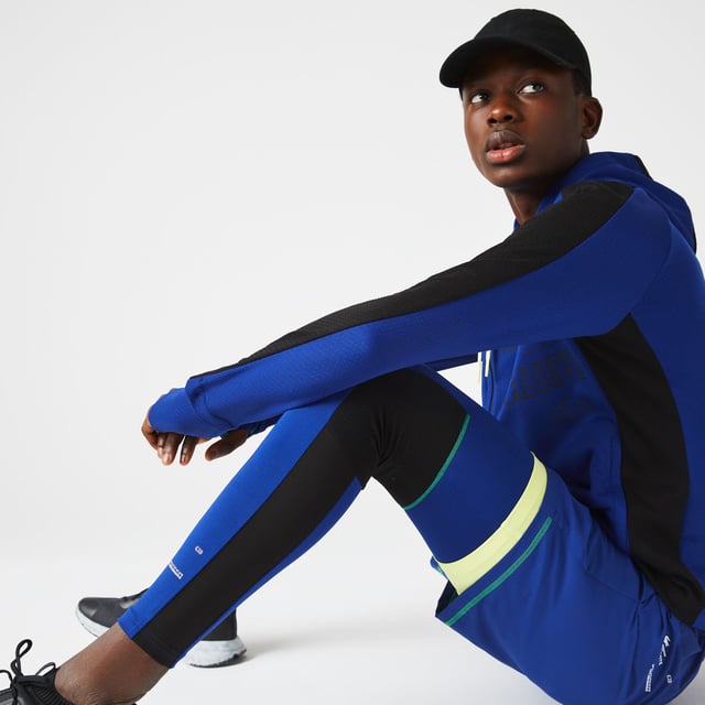 Men's Lacoste SPORT Leggings - Recycled stretch interlock and mesh - Elasticised waistband - Small pockets for keys on inside  contrast flat stitching  branding on ankle - Tight fit- Tone-on-tone silicone crocodile on hip- Ref: XH1045-PHK