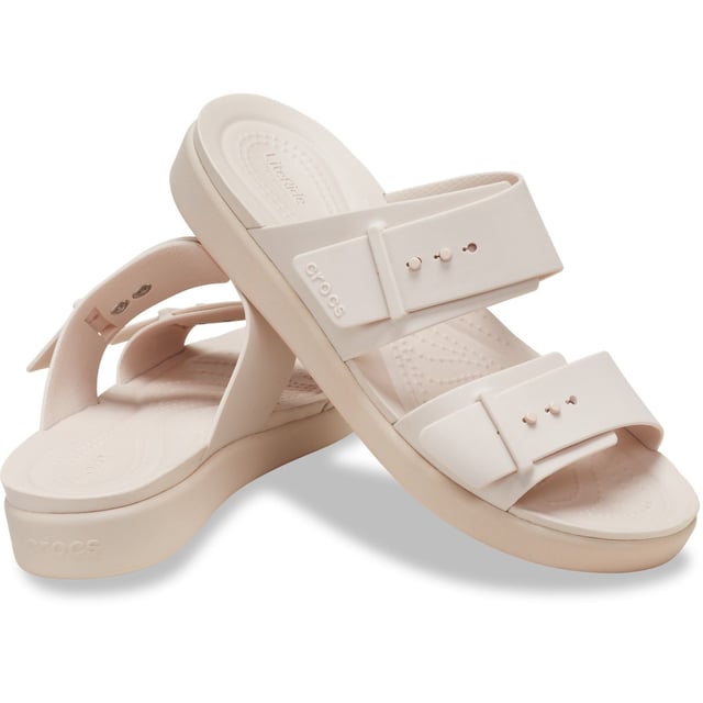 The two adjustable straps on the Brooklyn Sandal Low Wedge provide you with excellent fit and versatile styling. Crocs Brooklyn's lightweight construction and comfort technology allow you to move confidently from work to play without a fuss.