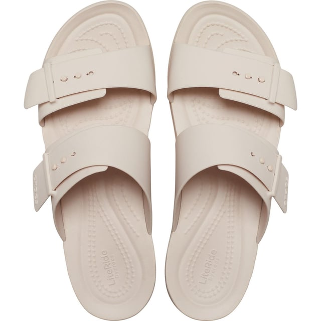 The two adjustable straps on the Brooklyn Sandal Low Wedge provide you with excellent fit and versatile styling. Crocs Brooklyn's lightweight construction and comfort technology allow you to move confidently from work to play without a fuss.