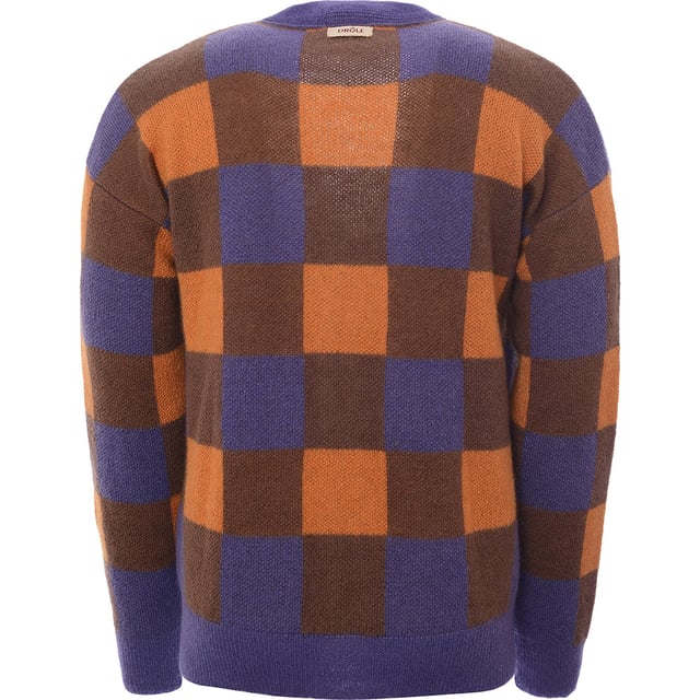 58% SUPERKID MOHAIR 37% PA 5%WO. DrÃ´le de Monsieur continues to remind us that itâ€™s â€œnot from Paris, madameâ€ - while growing our casualwear collection - with this Floral Logo Crew Knit. Epitomising the Dijon labelâ€™s ethos that big opportunities in creative industries like fashion shouldnâ€™t be limited to big capital cities, the slogan takes the limelight here in a fresh floral reboot to take root in any wardrobe.
