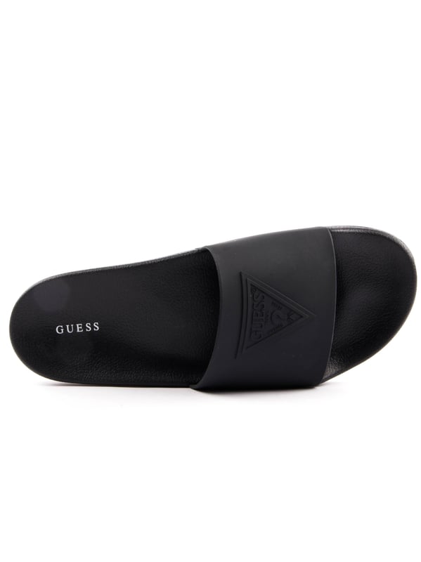 Guess Tokyom Herren Pantoletten Schwarz Synthetik. Authentischer Schuh der Marke Guess - Streetwear/Sportswear Design von Guess - Guess für modebewusste Männer, perfekt für den Alltag - Die schwarzen Guess Pantoletten lassen sich ideal mit dem Rest Ihrer Garderobe kombinieren - Bequeme Synthetikmaterial - Klassische Schnalle - Tokyom - Synthetik