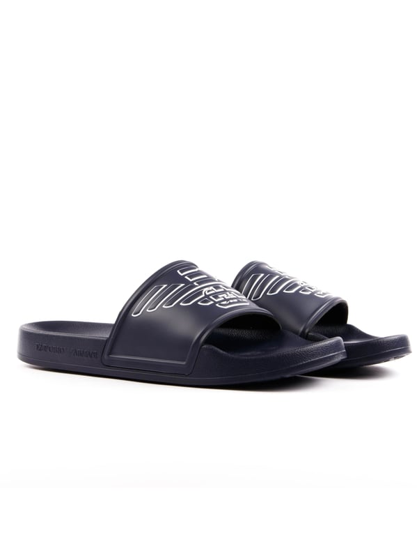 Claquette Emporio Armani Eagle Herren Blau Polyurethan. Authentischer Schuh der Marke Emporio Armani - Streetwear/Sportswear-Design von Emporio Armani - Emporio Armani für Herren Mode, perfekt für den Alltag - Die blaue Claquette Emporio Armani passt hervorragend zu Ihrer Garderobe - Bequemes Material aus Polyurethan - Klassische Schnalle - Eagle - Synthetisch