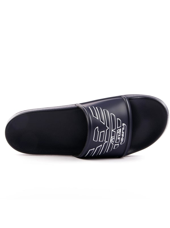 Claquette Emporio Armani Eagle Herren Blau Polyurethan. Authentischer Schuh der Marke Emporio Armani - Streetwear/Sportswear-Design von Emporio Armani - Emporio Armani für Herren Mode, perfekt für den Alltag - Die blaue Claquette Emporio Armani passt hervorragend zu Ihrer Garderobe - Bequemes Material aus Polyurethan - Klassische Schnalle - Eagle - Synthetisch