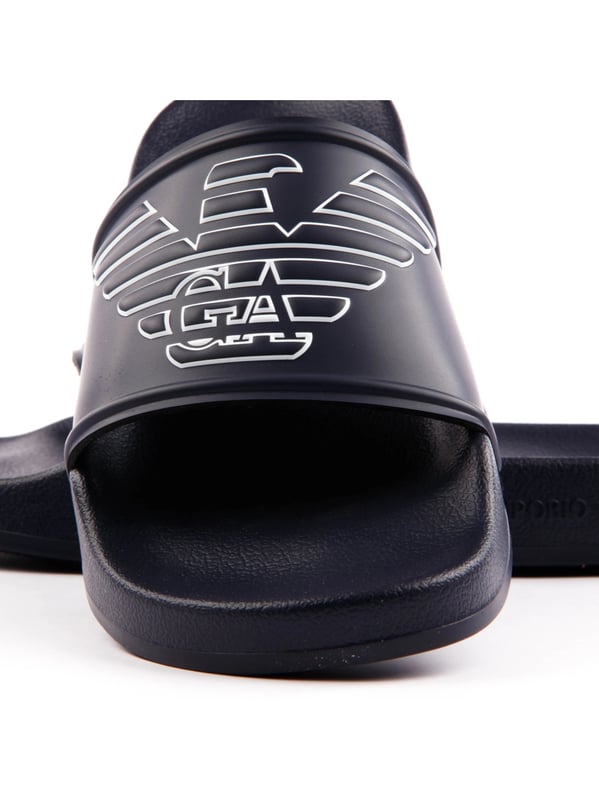 Claquette Emporio Armani Eagle Herren Blau Polyurethan. Authentischer Schuh der Marke Emporio Armani - Streetwear/Sportswear-Design von Emporio Armani - Emporio Armani für Herren Mode, perfekt für den Alltag - Die blaue Claquette Emporio Armani passt hervorragend zu Ihrer Garderobe - Bequemes Material aus Polyurethan - Klassische Schnalle - Eagle - Synthetisch