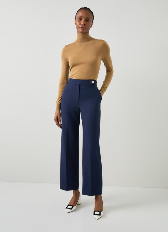 LK Bennett Billie Trousers, Navy Effortlessly step into sophistication with our Billie tailored crop wide trousers. These navy workwear essentials, crafted from a high-quality fabric blend, feature a timeless plain design that exudes elegance. Perfectly pair them with a crisp white blouse or a stylish silk top for a polished look.