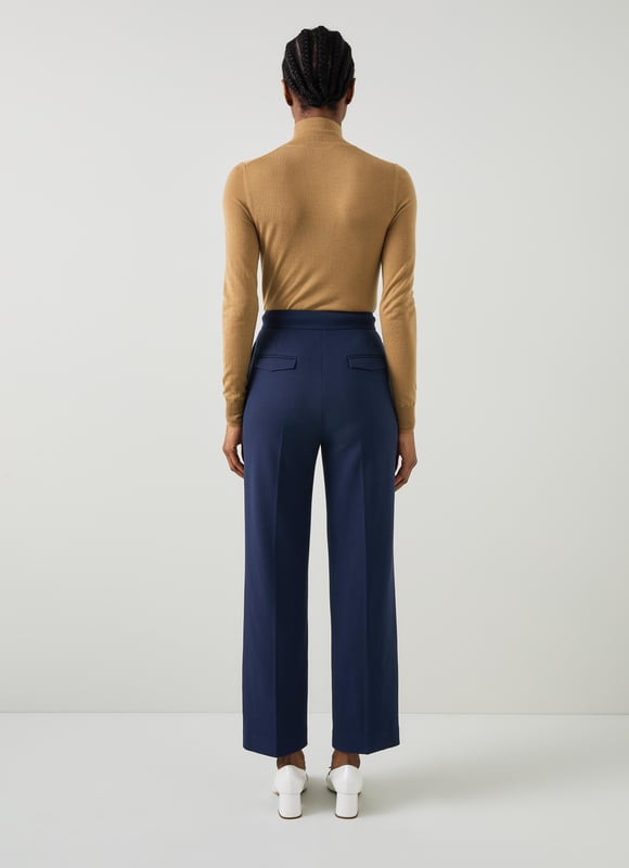 LK Bennett Billie Trousers, Navy Effortlessly step into sophistication with our Billie tailored crop wide trousers. These navy workwear essentials, crafted from a high-quality fabric blend, feature a timeless plain design that exudes elegance. Perfectly pair them with a crisp white blouse or a stylish silk top for a polished look.