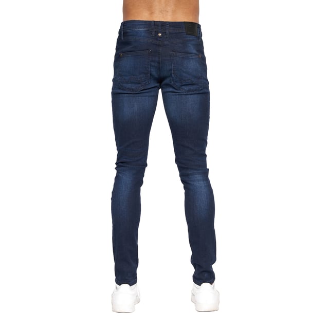 99% Cotton, 1% Elastane. Design: Plain. Pockets: 2 Side Pockets, 2 Back Pockets, 1 Coin Pocket. Fastening: Button, Zip Fly. Belt Loops, Branded Buttons, Woven Patch. Fit: Slim.