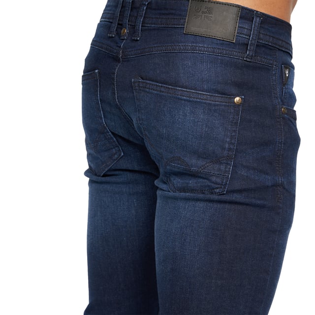 99% Cotton, 1% Elastane. Design: Plain. Pockets: 2 Side Pockets, 2 Back Pockets, 1 Coin Pocket. Fastening: Button, Zip Fly. Belt Loops, Branded Buttons, Woven Patch. Fit: Slim.