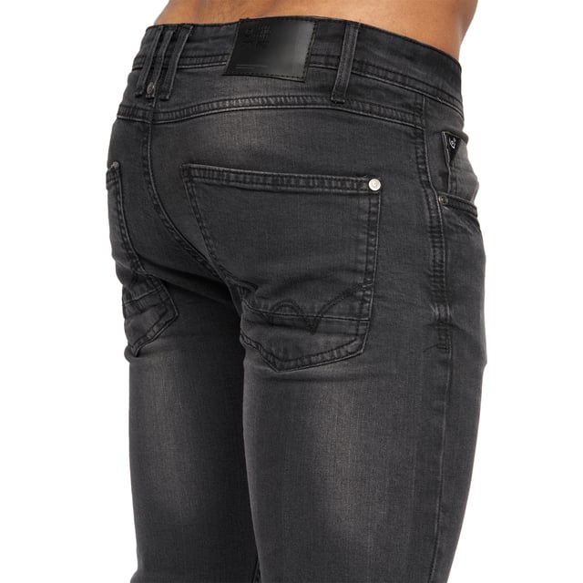 99% Cotton, 1% Elastane. Design: Plain. Pockets: 2 Side Pockets, 2 Back Pockets, 1 Coin Pocket. Fastening: Button, Zip Fly. Belt Loops, Branded Buttons, Woven Patch. Fit: Slim.