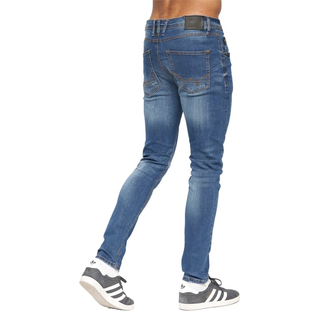 99% Cotton, 1% Elastane. Design: Logo, Ripped. Pockets: 2 Side Pockets, 1 Coin Pocket, 2 Back Pockets. Fastening: Button, Zip Fly. Belt Loops, Branded Buttons, Riveted. Fit: Slim.