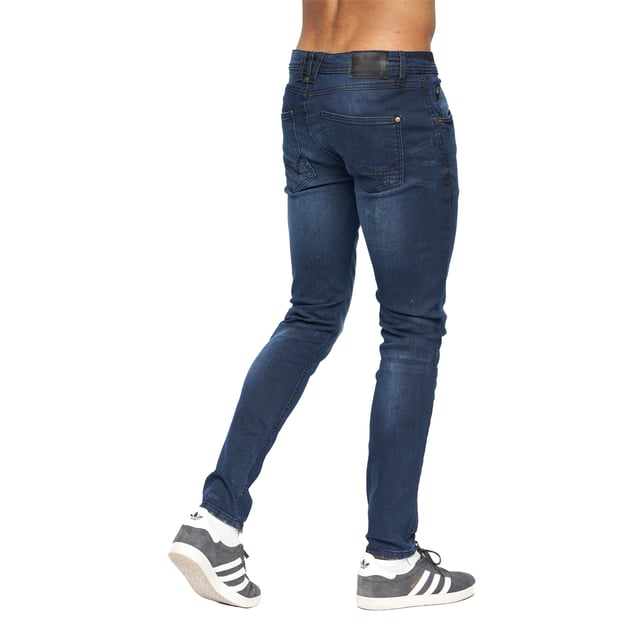 99% Cotton, 1% Elastane. Design: Logo, Ripped. Pockets: 2 Side Pockets, 1 Coin Pocket, 2 Back Pockets. Fastening: Button, Zip Fly. Belt Loops, Branded Buttons, Riveted. Fit: Slim.