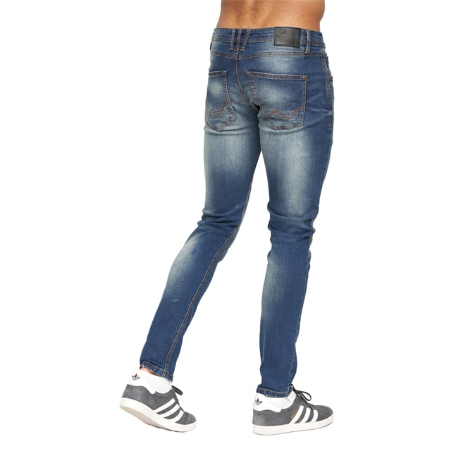 99% Cotton, 1% Elastane. Design: Logo, Ripped. Pockets: 2 Side Pockets, 1 Coin Pocket, 2 Back Pockets. Fastening: Button, Zip Fly. Belt Loops, Branded Buttons, Riveted. Fit: Slim.