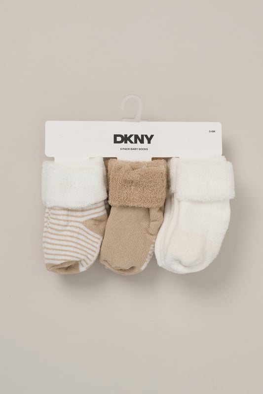 Soft, breathable, and made for comfort, this 6-pack of baby socks from DKNY is crafted from a terry cotton blend with just the right amount of stretch. Ideal for pairing with everyday outfits or sleepwear, they offer a secure and gentle fit all day long. A Spring/Summer staple for growing feet.