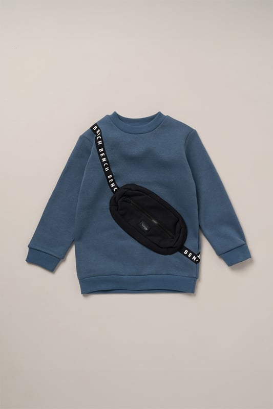 This 2-piece set from Bench includes a standout sweatshirt with a stitched imitation cross body bag detail and matching shorts for a coordinated, streetwear-inspired look. Made from soft brushed sweat fabric and finished with ribbed trims for comfort, it’s an easy go-to for laid-back days. The playful bag detail brings added personality, while the matching shorts complete the look with ease. Perfect for casual wear with a cool, urban edge.