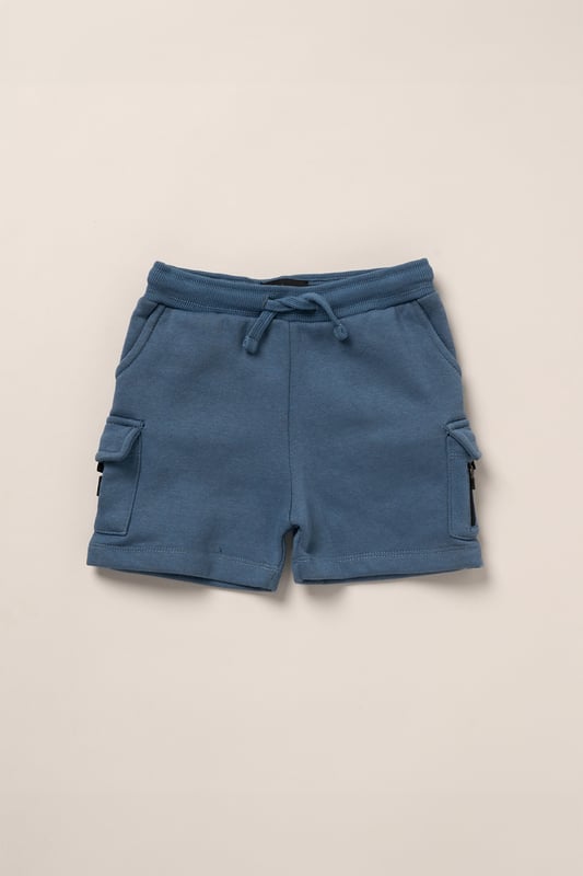 This 2-piece set from Bench includes a standout sweatshirt with a stitched imitation cross body bag detail and matching shorts for a coordinated, streetwear-inspired look. Made from soft brushed sweat fabric and finished with ribbed trims for comfort, it’s an easy go-to for laid-back days. The playful bag detail brings added personality, while the matching shorts complete the look with ease. Perfect for casual wear with a cool, urban edge.
