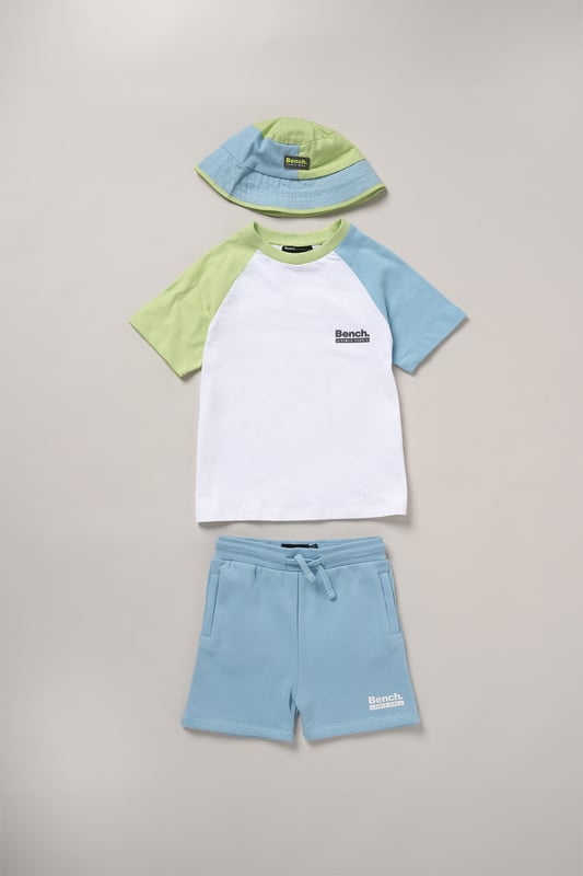 Upgrade everyday style with this easygoing three-piece set from Bench, featuring a classic cotton T-shirt, soft sweat shorts, and a coordinating cotton twill hat. The brushed sweat fabric offers a comfy feel, while ribbed trims and a flat woven drawcord add function and fit. Designed for casual versatility, this outfit set delivers effortless comfort from top to toe.