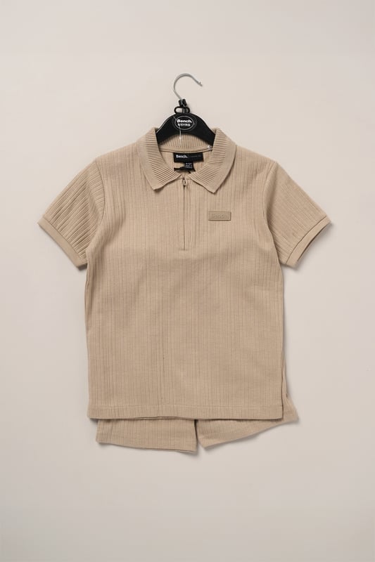 This easy set from Bench includes a ribbed polo shirt and matching shorts made from soft cotton with a bit of stretch for comfort. The ribbed texture gives it a nice finish while still being comfortable to wear. A great choice for everyday wear or casual outings.