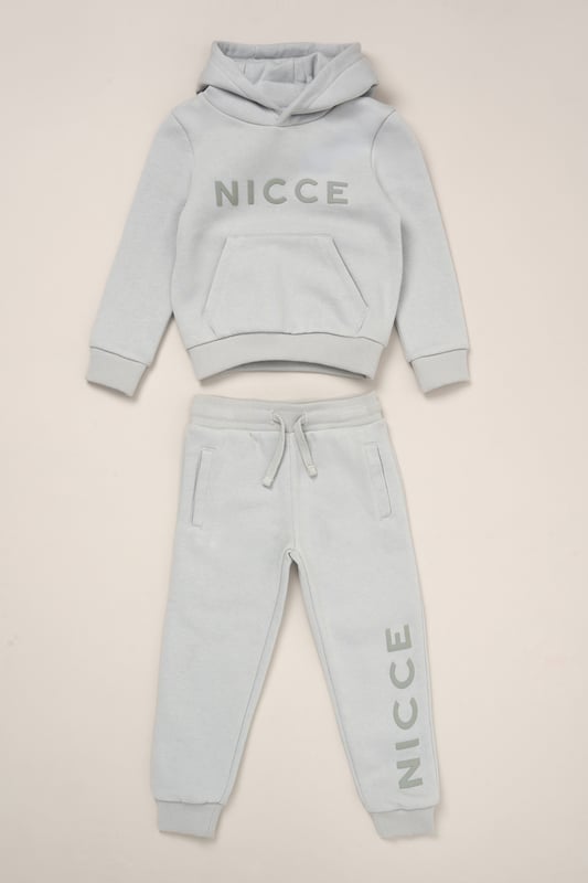 Perfect for play or winding down, this matching hoody and jogger set from Nicce offers soft comfort with a casual edge. Crafted from cosy brushed-back sweat fabric with a self-lined hood and stretchy ribbed details for a snug fit. A flat cotton drawcord adds a functional finish.