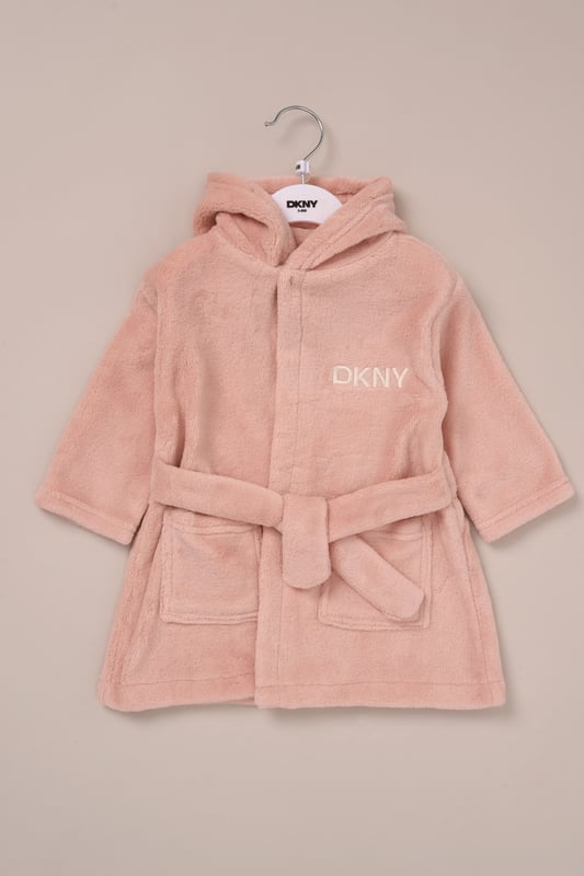 Perfect for after-bath cuddles or lazy mornings, this cosy fleece robe from DKNY is made from soft-touch coral fleece for a gentle feel against baby’s skin. Lightweight yet snuggly, it’s a great extra layer for Spring and Summer evenings at home. Finished with a waist tie for a secure fit.