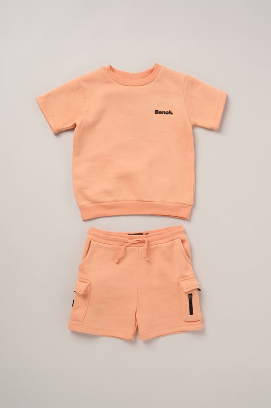 Update their casual wardrobe with this easy-wear 3-piece set from Bench, featuring a soft short sleeve sweatshirt, coordinating shorts, and cotton-rich crew socks. Designed with comfort in mind, the set combines brushed sweat fabric and stretchy ribbed trims for a relaxed fit. A go-to outfit for downtime, play, or everyday adventures.