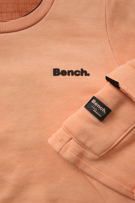 Update their casual wardrobe with this easy-wear 3-piece set from Bench, featuring a soft short sleeve sweatshirt, coordinating shorts, and cotton-rich crew socks. Designed with comfort in mind, the set combines brushed sweat fabric and stretchy ribbed trims for a relaxed fit. A go-to outfit for downtime, play, or everyday adventures.