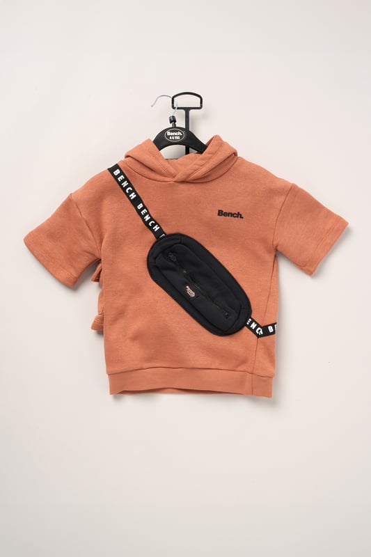 This 2-piece set from Bench includes a standout sweatshirt with a stitched imitation cross body bag detail and matching shorts for a coordinated, streetwear-inspired look. Made from soft brushed sweat fabric and finished with ribbed trims for comfort, it’s an easy go-to for laid-back days. The playful bag detail brings added personality, while the matching shorts complete the look with ease. Perfect for casual wear with a cool, urban edge.