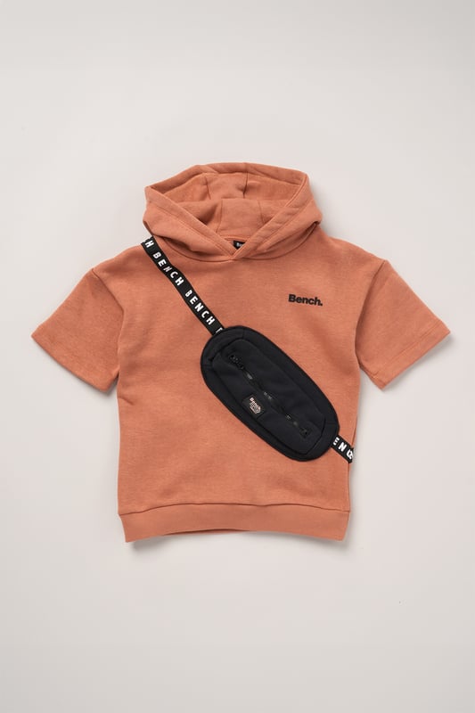 This 2-piece set from Bench includes a standout sweatshirt with a stitched imitation cross body bag detail and matching shorts for a coordinated, streetwear-inspired look. Made from soft brushed sweat fabric and finished with ribbed trims for comfort, it’s an easy go-to for laid-back days. The playful bag detail brings added personality, while the matching shorts complete the look with ease. Perfect for casual wear with a cool, urban edge.