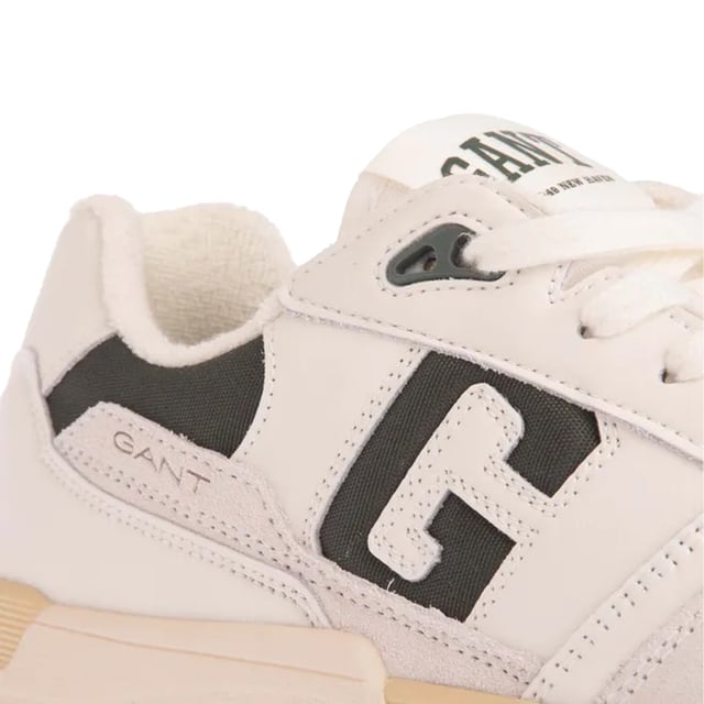 Upper: Cow Suede Leather, Nylon. Lining: Terry. Outsole: Rubber. 6 Eyelets. Flat. Cut: Low. Design: Logo, Perforated. Toe Style: Round. Fastening: Lace Up.