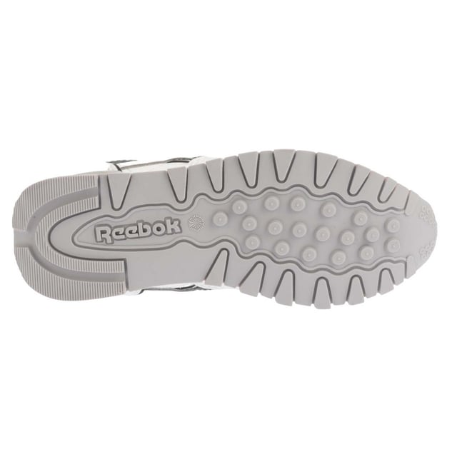 Marke: Reebok. Obermaterial: Synthetischer Stoff. Mittelsohle: EVA (Ethyl-Vinylacetat). Laufsohle: Abriebfest, Gummi. Ösen: 5. Absatz: Flach. niedrig geschnitten. Design: Logo, Seitenstreifen. Zehenstil: Rund. Zum Schnüren.