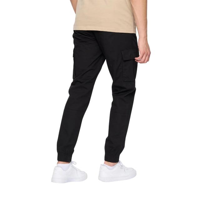 100% Baumwolle. Design: Logo, Unifarben. Gewebetechnik: langlebig. Taschenart: Zwei Taschen am Oberschenkel, Reißverschluss. Taille: Kontrastfarbene Durchzugskordel, Elastisch. Saum: Elastisch.