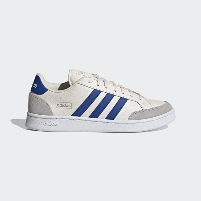Vintage vibes. New soul. These shoes have a clean and contemporary design with the bones of '70s-era tennis trainers. This version has soft suede overlays and and a textured leather upper.  - Regular fit - Lace closure - Leather upper with suede toe and heel overlays - Cushioned feel - Tennis-inspired shoes - Cloudfoam Comfort sockliner and textile lining - Rubber cupsole  Shipped by adidas