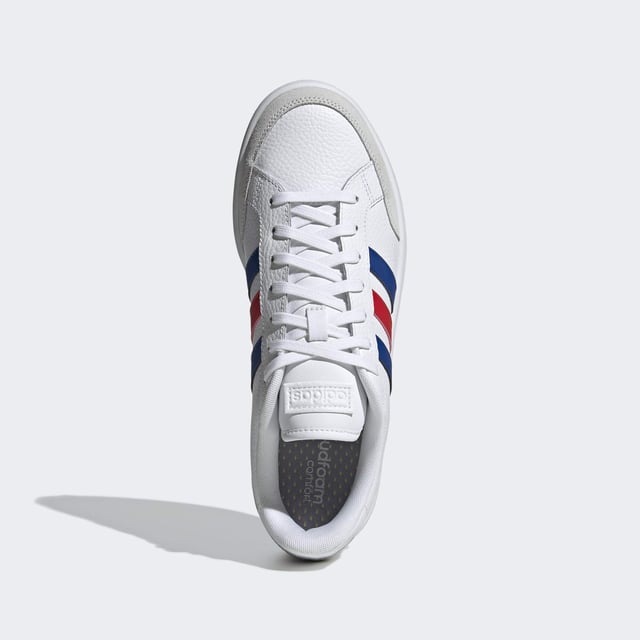 Vintage vibes. New soul. These shoes have a clean and contemporary design with the bones of '70s-era tennis trainers. This version has soft suede overlays and and a textured leather upper.  - Regular fit - Lace closure - Leather upper with suede toe and heel overlays - Cushioned feel - Tennis-inspired shoes - Cloudfoam Comfort sockliner and textile lining - Rubber cupsole  Shipped by adidas