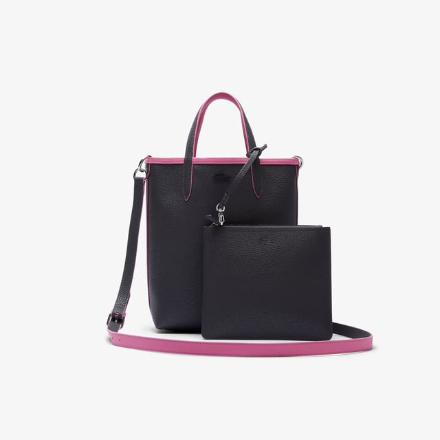 Anna Vertical Reversible Tote Dimensions: L8.7 x H11.4 x D 3.9in - L22 x H29 x D10cm  Removable  adjustable strap: 51in - 130cm Reversible bag with one grained and one piqué-effect embossed side Removable zipped pouch.Metal crocodile on one side