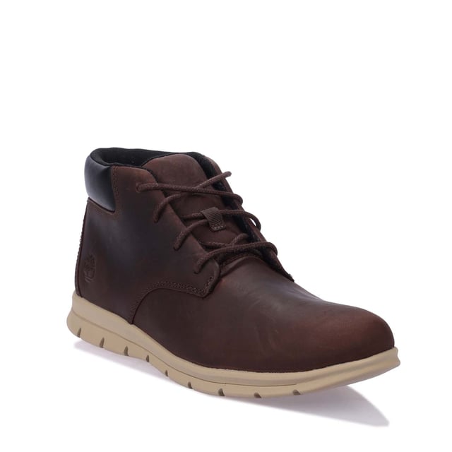 Mens Timberland Graydon Mid Lace Boots in dark brown.- Leather upper.- Lace-up style.- Cushioned collar and tongue.- Embossed logo on heel.- HoverLite comfort outsole and ReBOTL fabric lining.- Durable rubber outsole.- Ref: A5SEZV131